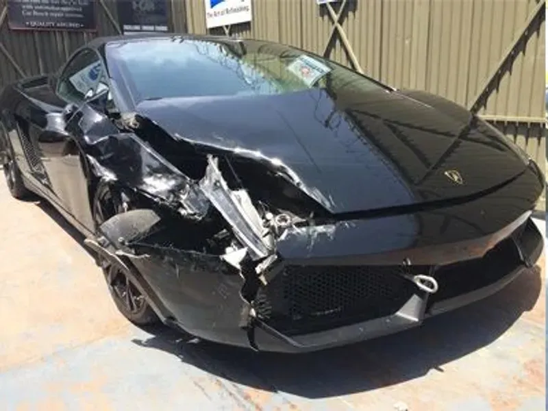 Lamborghini Gallardo with collision damage — Front-end collision — before repair at F1 Collision, Van Nuys