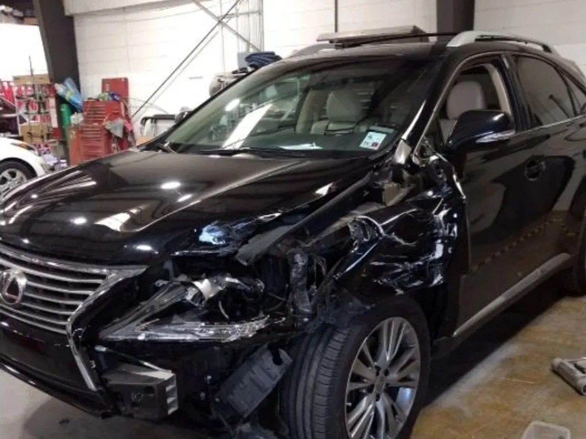 Lexus RX with collision damage — Front-end collision — before repair at F1 Collision, Van Nuys